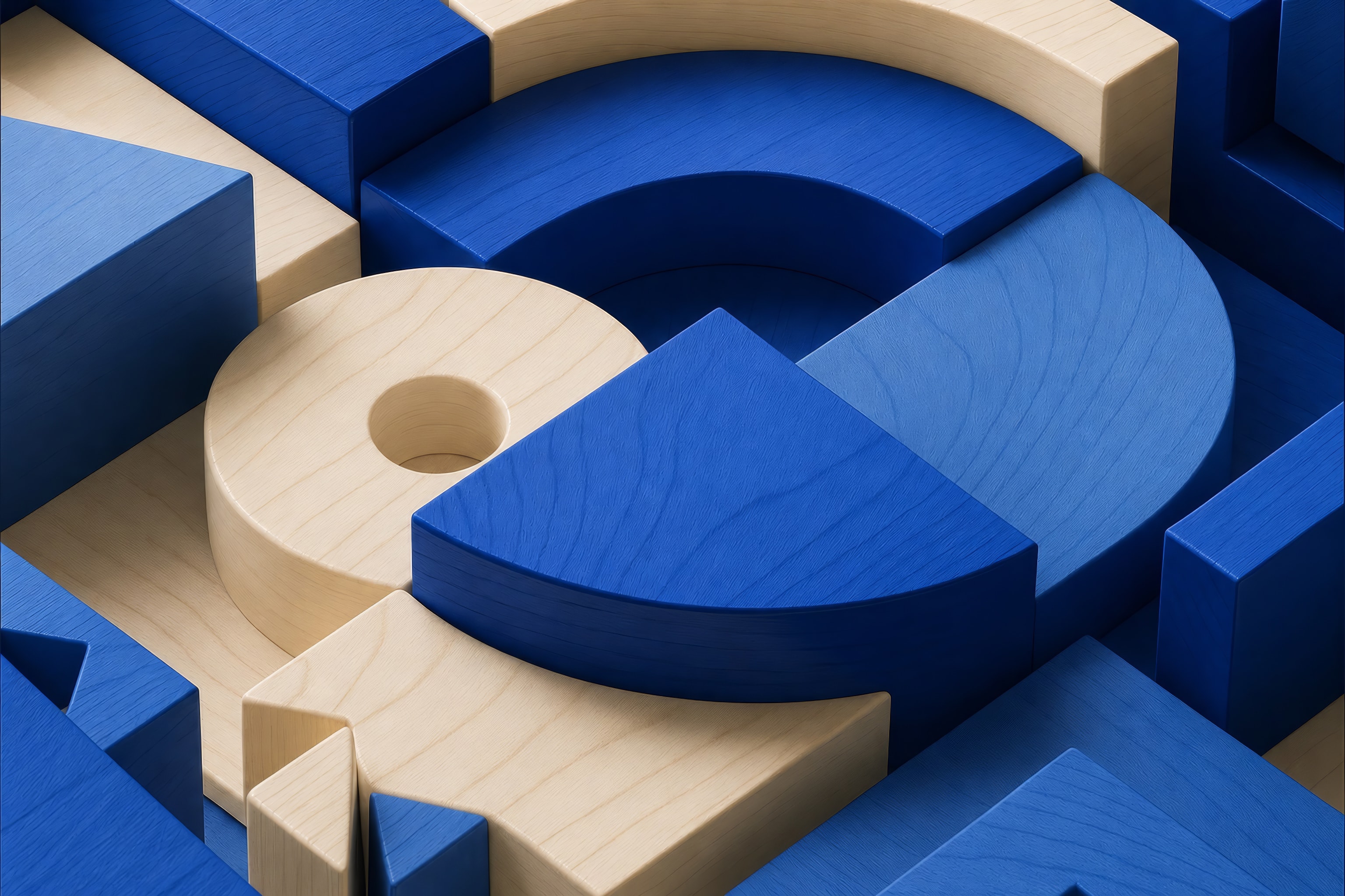 Cobalt and maple-wood geometric forms behind the Cobalt workspace.